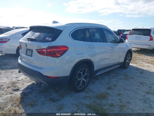 Photo 3 VIN: WBXHT3C38J5K22276 - BMW X1 