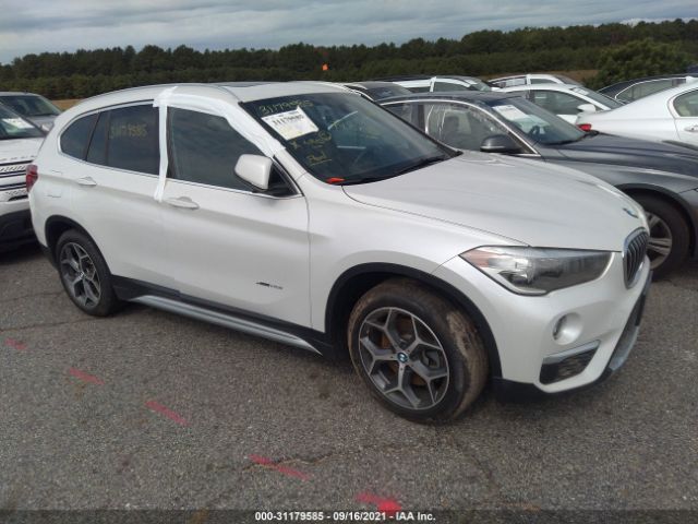 Photo 0 VIN: WBXHT3C38J5K22780 - BMW X1 