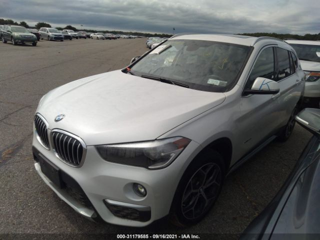 Photo 1 VIN: WBXHT3C38J5K22780 - BMW X1 