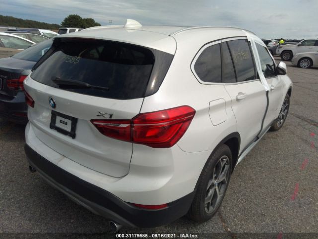 Photo 3 VIN: WBXHT3C38J5K22780 - BMW X1 