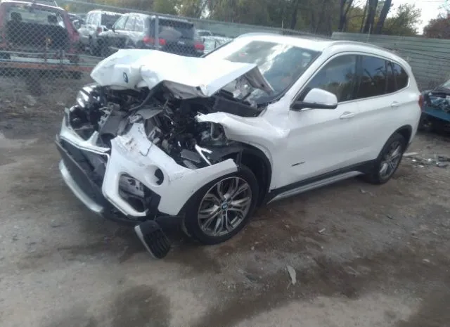 Photo 1 VIN: WBXHT3C38J5K32113 - BMW X1 