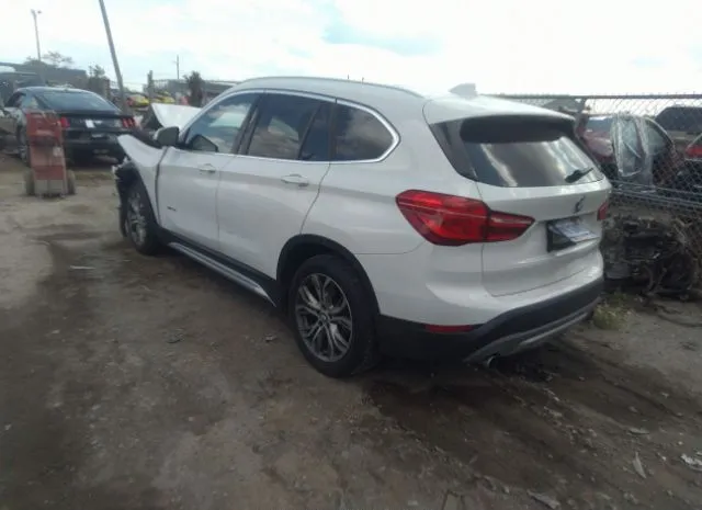 Photo 2 VIN: WBXHT3C38J5K32113 - BMW X1 