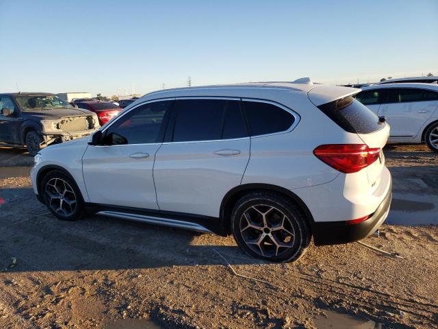 Photo 1 VIN: WBXHT3C38J5L32034 - BMW X1 