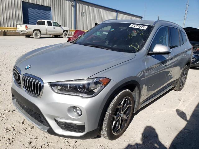 Photo 1 VIN: WBXHT3C39G5E47589 - BMW X1 