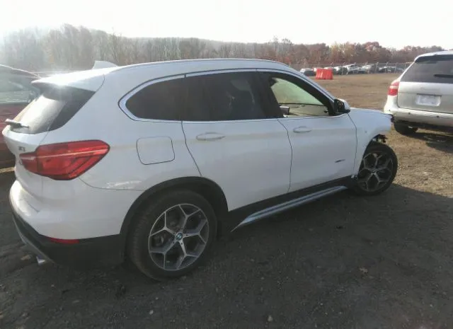 Photo 3 VIN: WBXHT3C39G5F64539 - BMW X1 