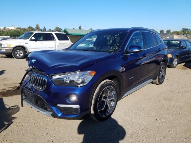 Photo 1 VIN: WBXHT3C39G5F66016 - BMW X1 