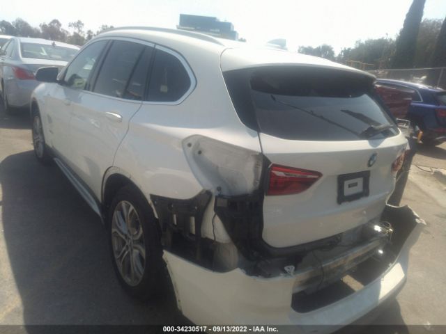 Photo 2 VIN: WBXHT3C39G5F67070 - BMW X1 