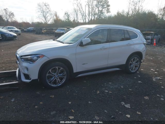 Photo 1 VIN: WBXHT3C39GP881979 - BMW X1 