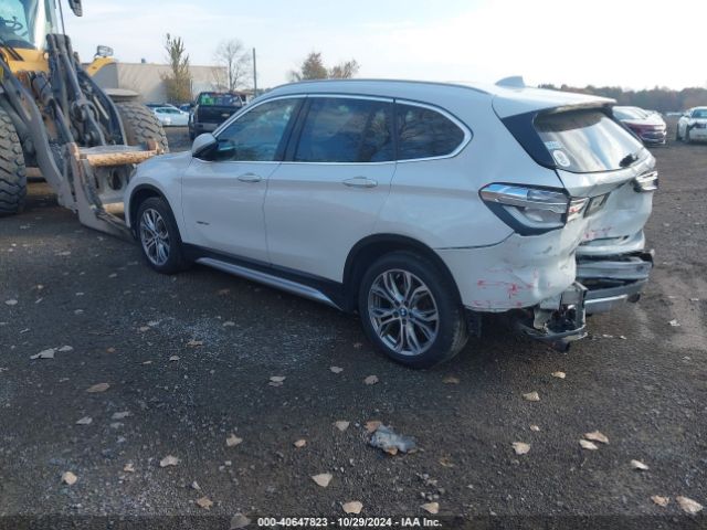 Photo 2 VIN: WBXHT3C39GP881979 - BMW X1 