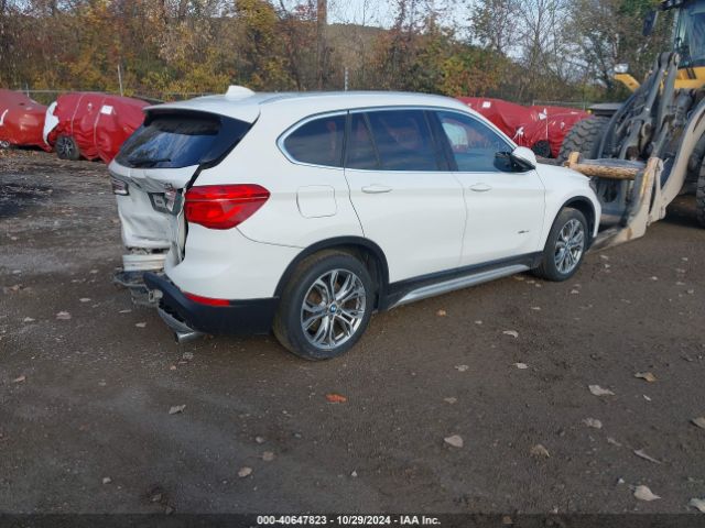 Photo 3 VIN: WBXHT3C39GP881979 - BMW X1 