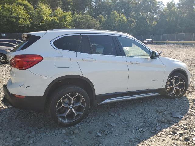 Photo 2 VIN: WBXHT3C39GP882744 - BMW X1 