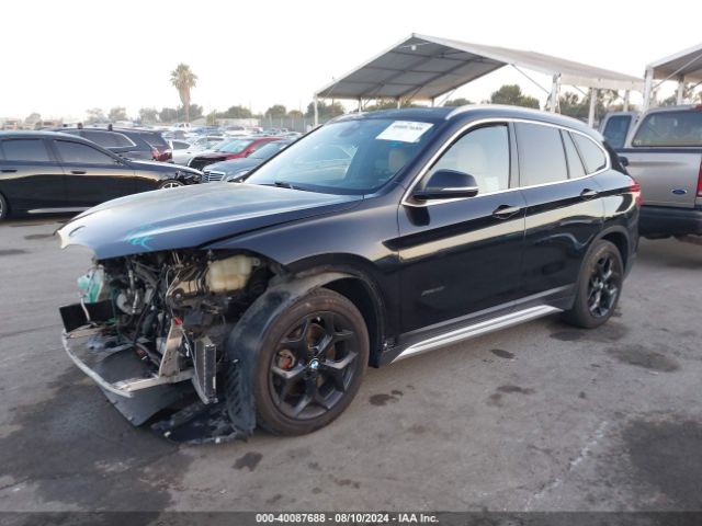 Photo 1 VIN: WBXHT3C39GP883277 - BMW X1 