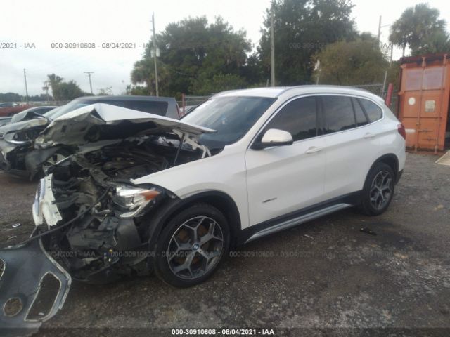 Photo 1 VIN: WBXHT3C39GP886275 - BMW X1 