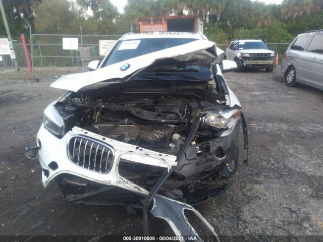 Photo 5 VIN: WBXHT3C39GP886275 - BMW X1 