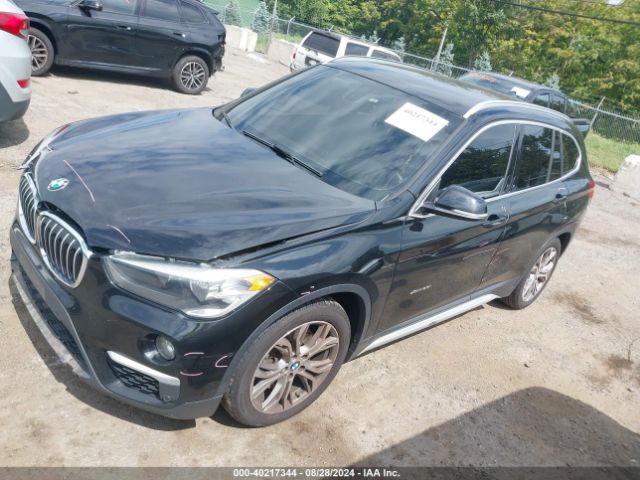 Photo 1 VIN: WBXHT3C39GP889211 - BMW X1 