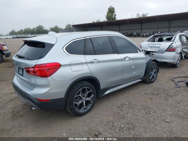 Photo 3 VIN: WBXHT3C39GP889581 - BMW X1 