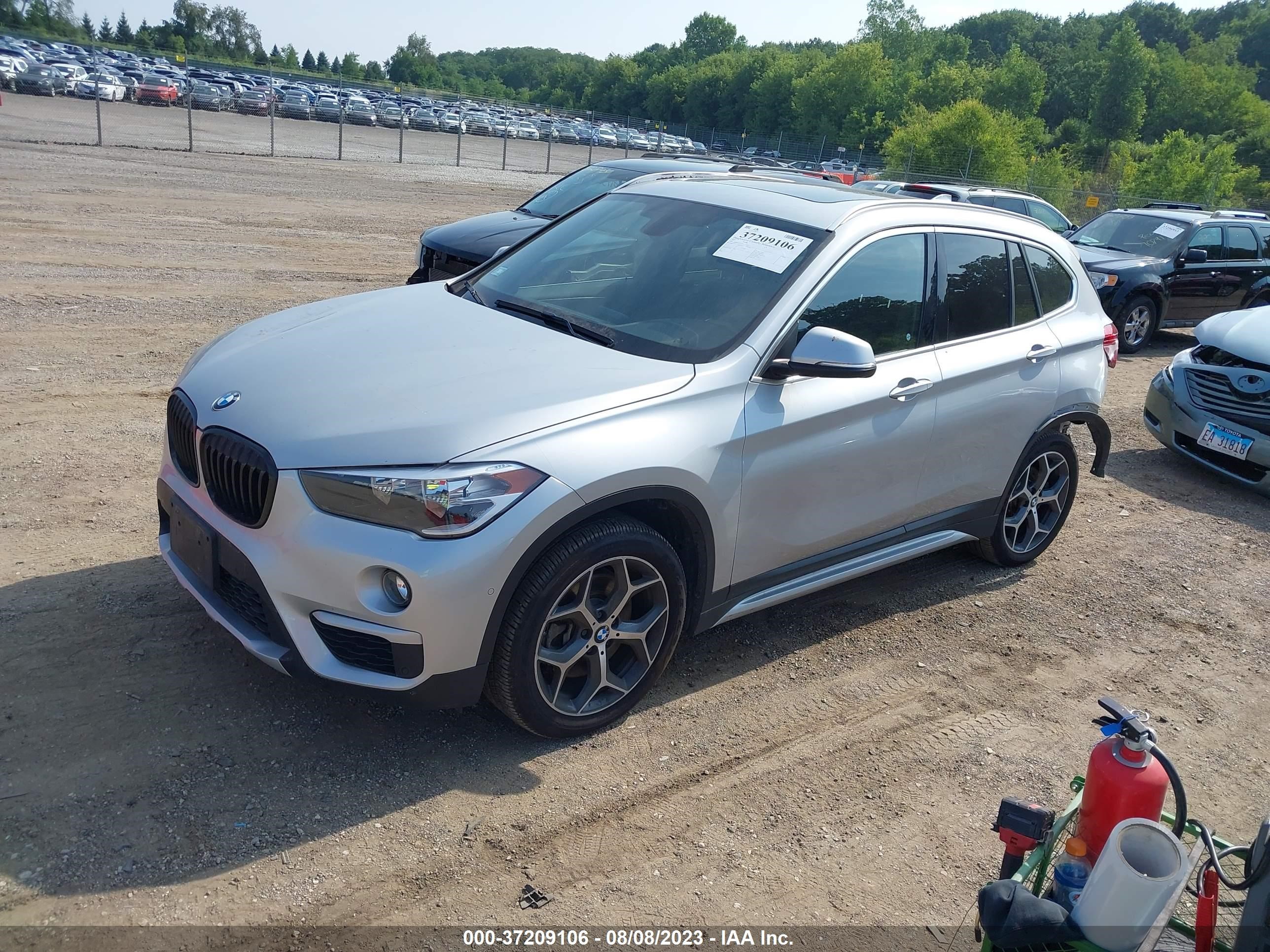 Photo 1 VIN: WBXHT3C39H5F73324 - BMW X1 