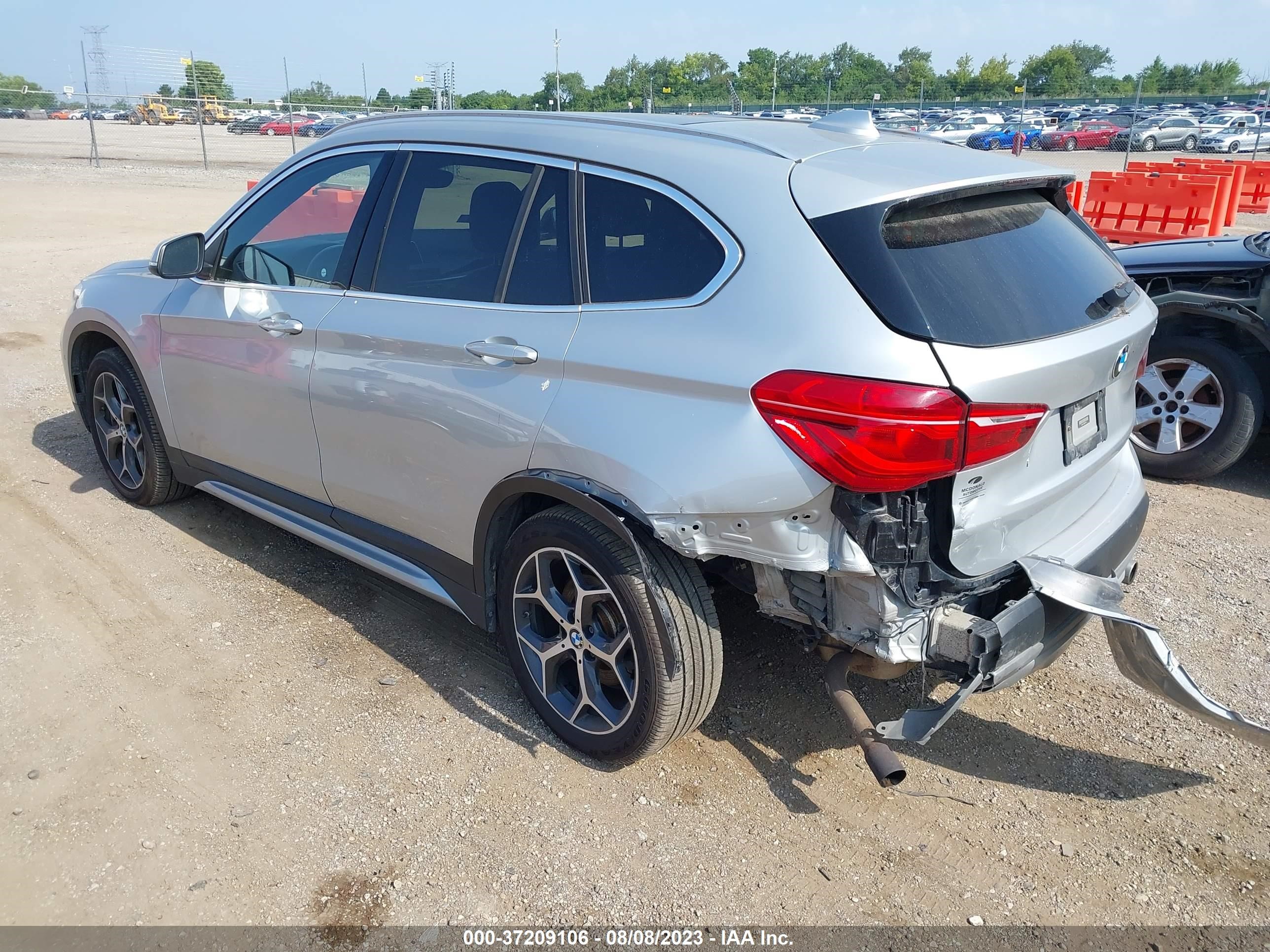 Photo 2 VIN: WBXHT3C39H5F73324 - BMW X1 