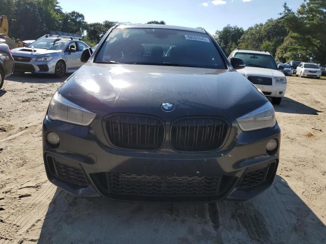 Photo 4 VIN: WBXHT3C39H5F74750 - BMW X1 