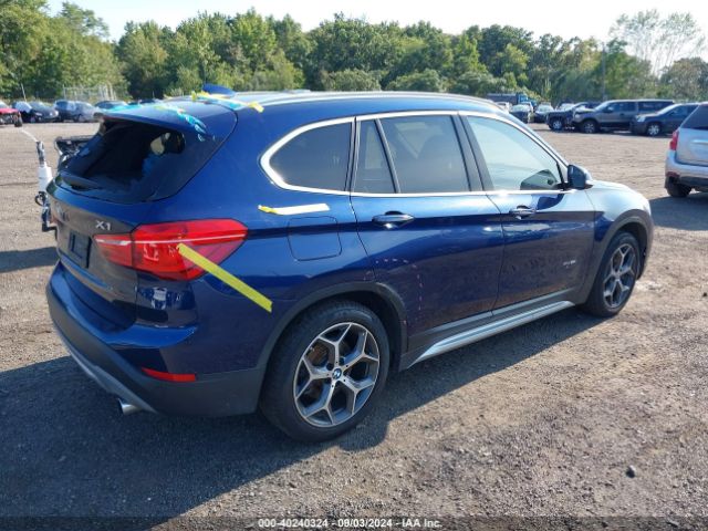 Photo 3 VIN: WBXHT3C39H5F78779 - BMW X1 