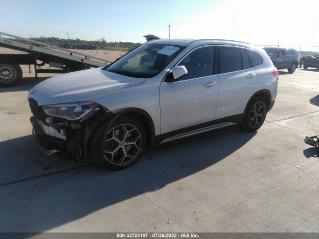 Photo 1 VIN: WBXHT3C39J3H31436 - BMW X1 