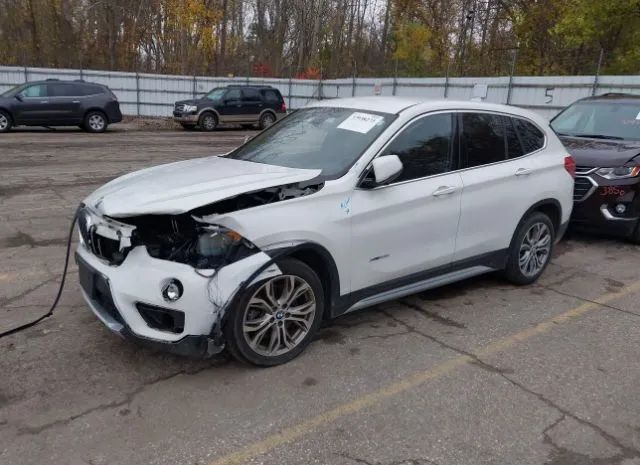 Photo 1 VIN: WBXHT3C39J5F88573 - BMW X1 