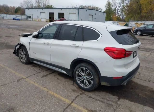 Photo 2 VIN: WBXHT3C39J5F88573 - BMW X1 