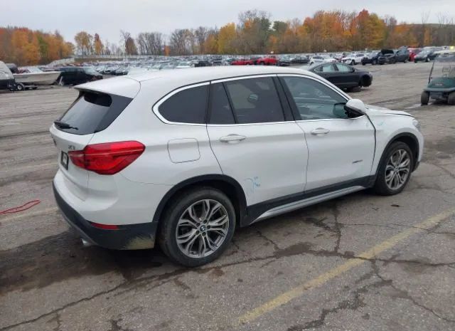 Photo 3 VIN: WBXHT3C39J5F88573 - BMW X1 