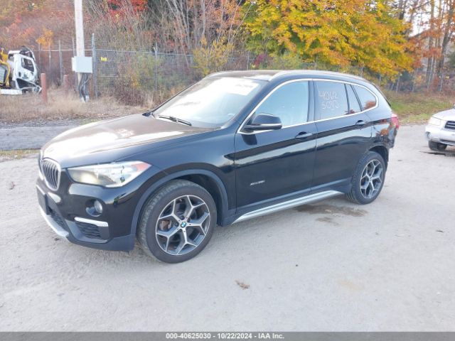 Photo 1 VIN: WBXHT3C39J5K30418 - BMW X1 