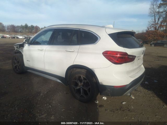 Photo 2 VIN: WBXHT3C39J5K32055 - BMW X1 