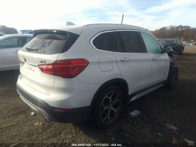 Photo 3 VIN: WBXHT3C39J5K32055 - BMW X1 