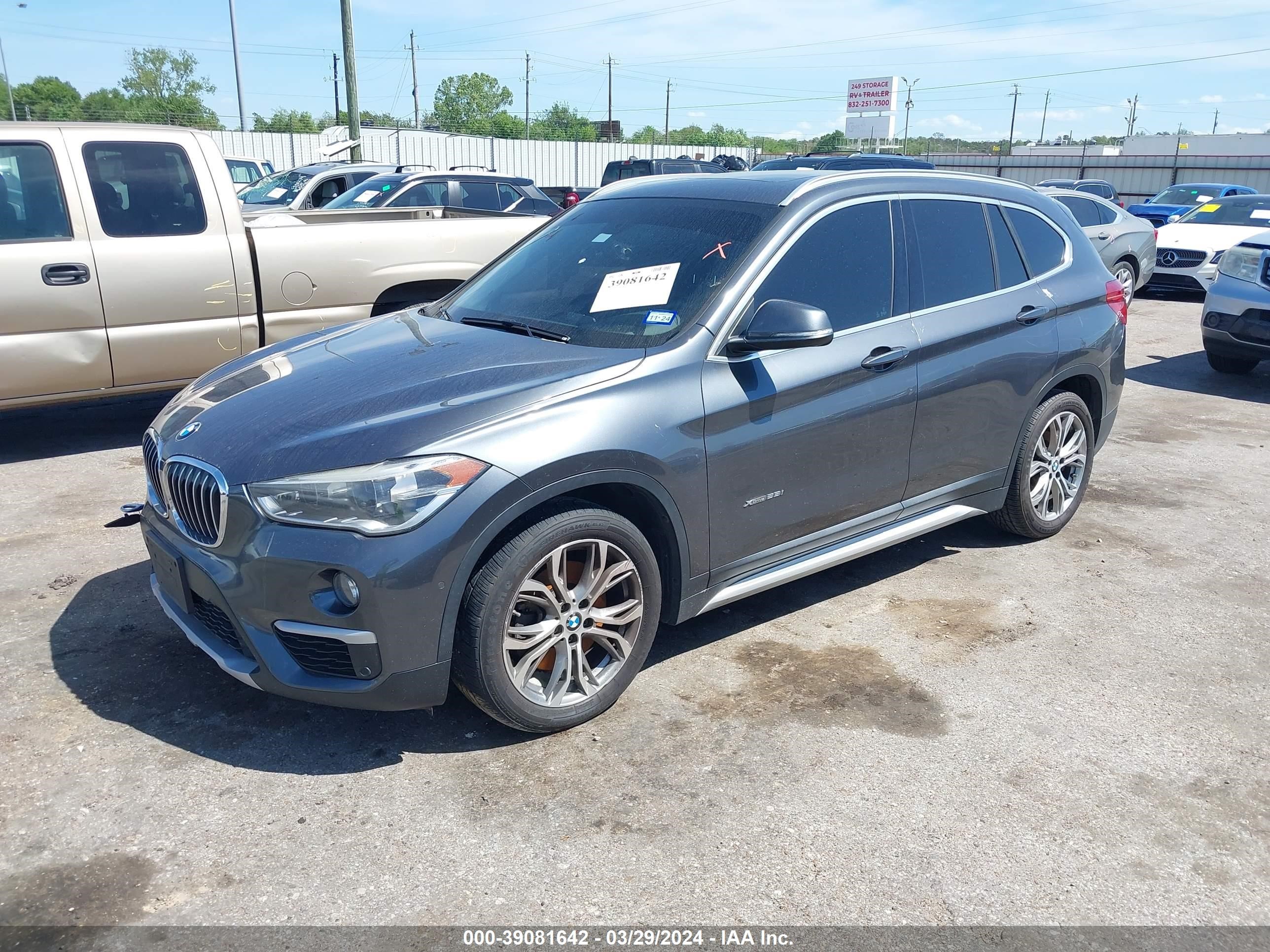 Photo 1 VIN: WBXHT3C3XG5E47181 - BMW X1 