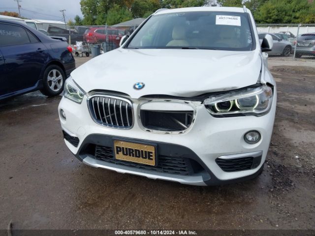 Photo 5 VIN: WBXHT3C3XG5E48220 - BMW X1 