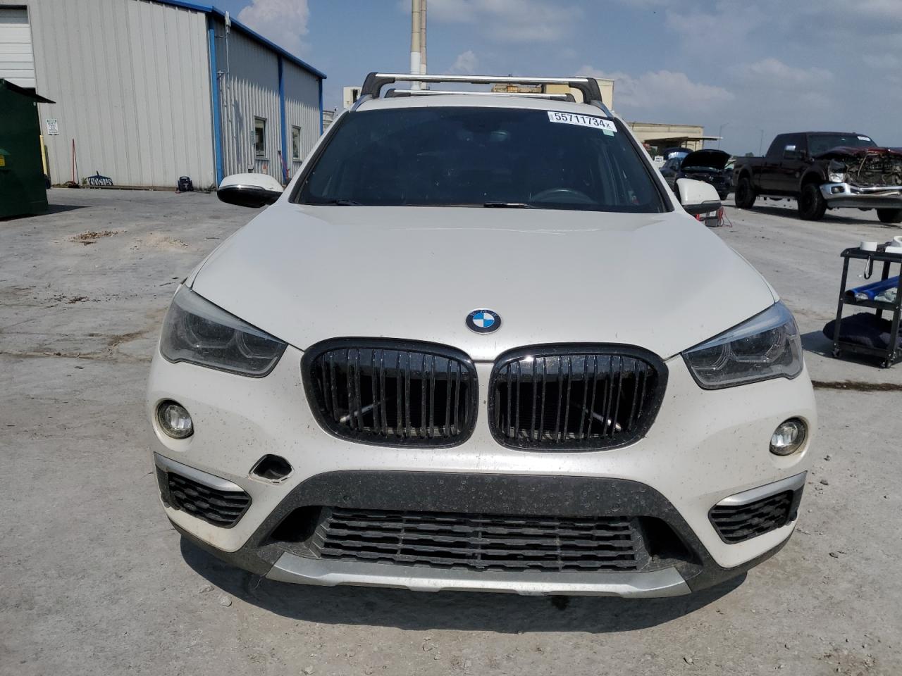 Photo 4 VIN: WBXHT3C3XG5E48928 - BMW X1 