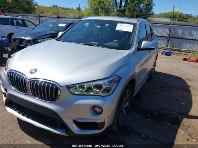 Photo 1 VIN: WBXHT3C3XG5F64873 - BMW X1 