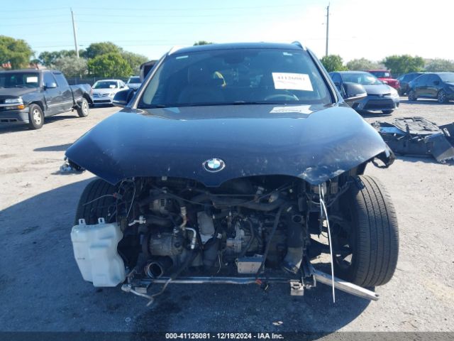 Photo 5 VIN: WBXHT3C3XGP881828 - BMW X1 