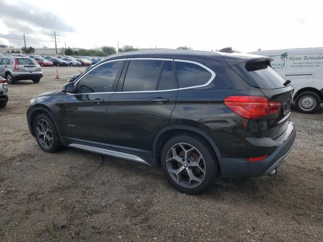 Photo 1 VIN: WBXHT3C3XGP884454 - BMW X1 