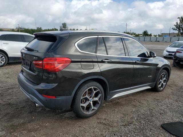 Photo 2 VIN: WBXHT3C3XGP884454 - BMW X1 