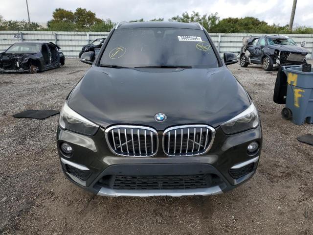 Photo 4 VIN: WBXHT3C3XGP884454 - BMW X1 