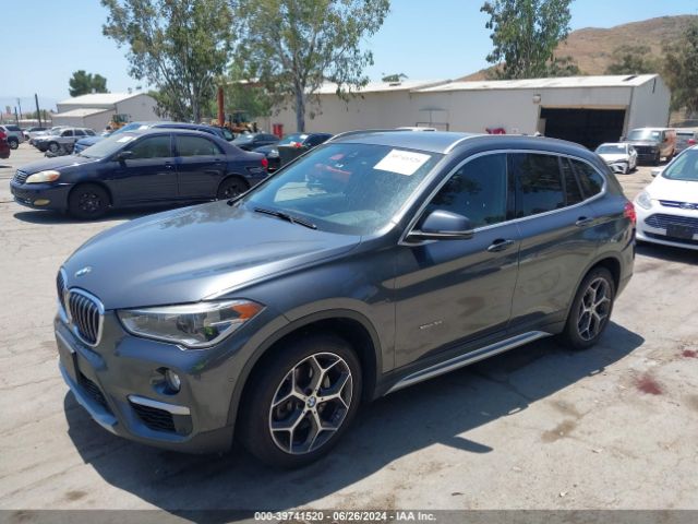 Photo 1 VIN: WBXHT3C3XGP885376 - BMW X1 