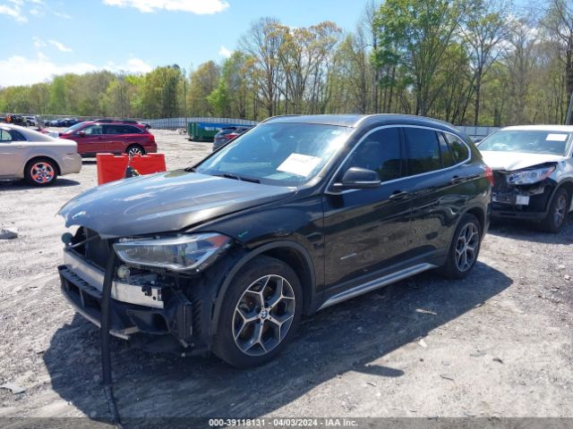 Photo 1 VIN: WBXHT3C3XGP889833 - BMW X1 