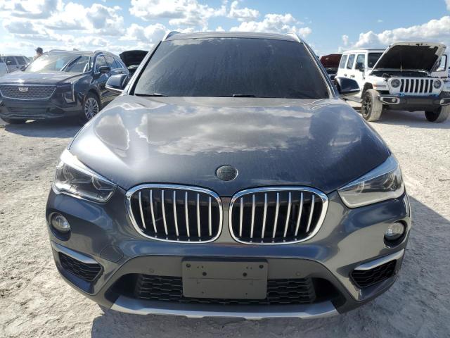 Photo 4 VIN: WBXHT3C3XH5F71873 - BMW X1 XDRIVE2 