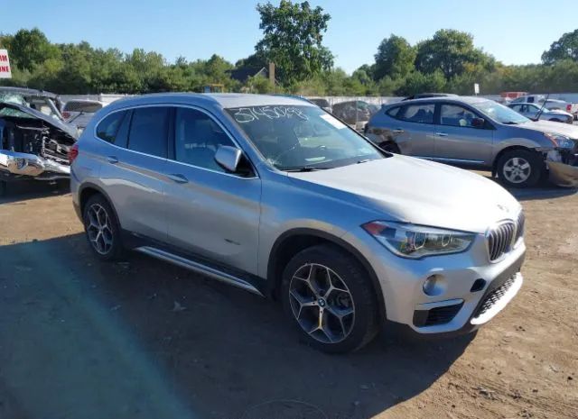 Photo 0 VIN: WBXHT3C3XH5F73297 - BMW X1 