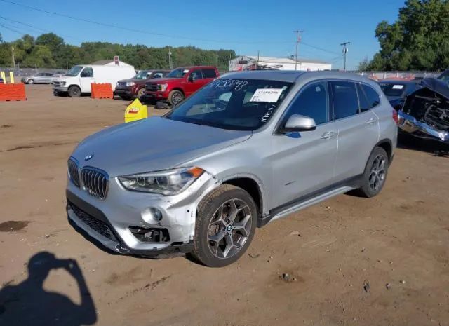 Photo 1 VIN: WBXHT3C3XH5F73297 - BMW X1 