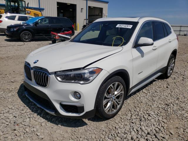 Photo 1 VIN: WBXHT3C3XH5F73879 - BMW X1 