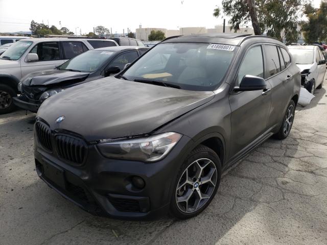 Photo 1 VIN: WBXHT3C3XH5F77009 - BMW X1 