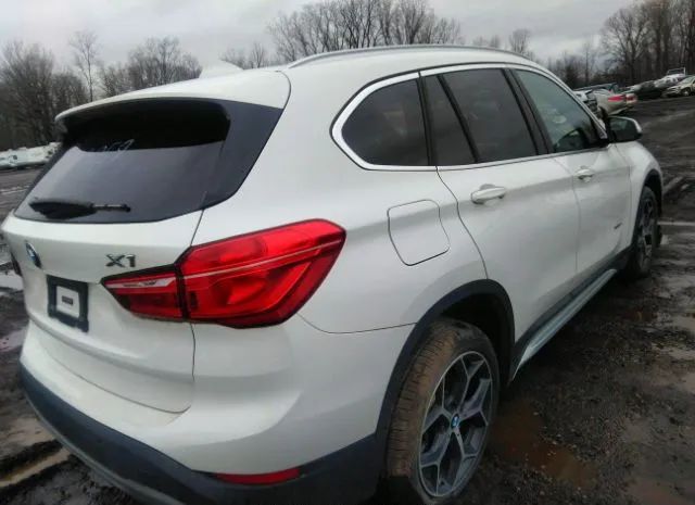 Photo 3 VIN: WBXHT3C3XH5F77267 - BMW X1 