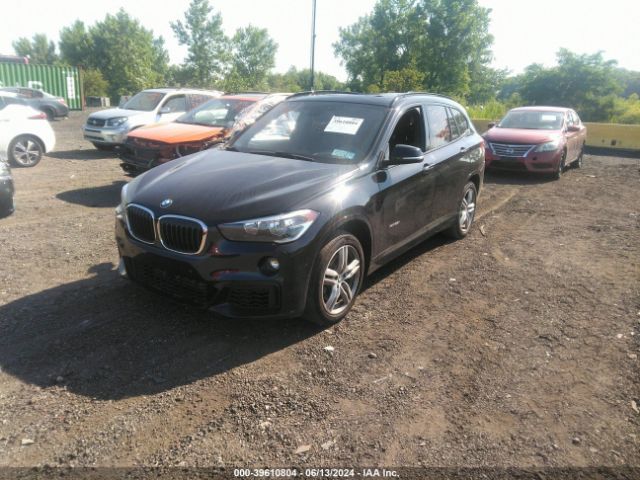 Photo 1 VIN: WBXHT3C3XH5F77656 - BMW X1 