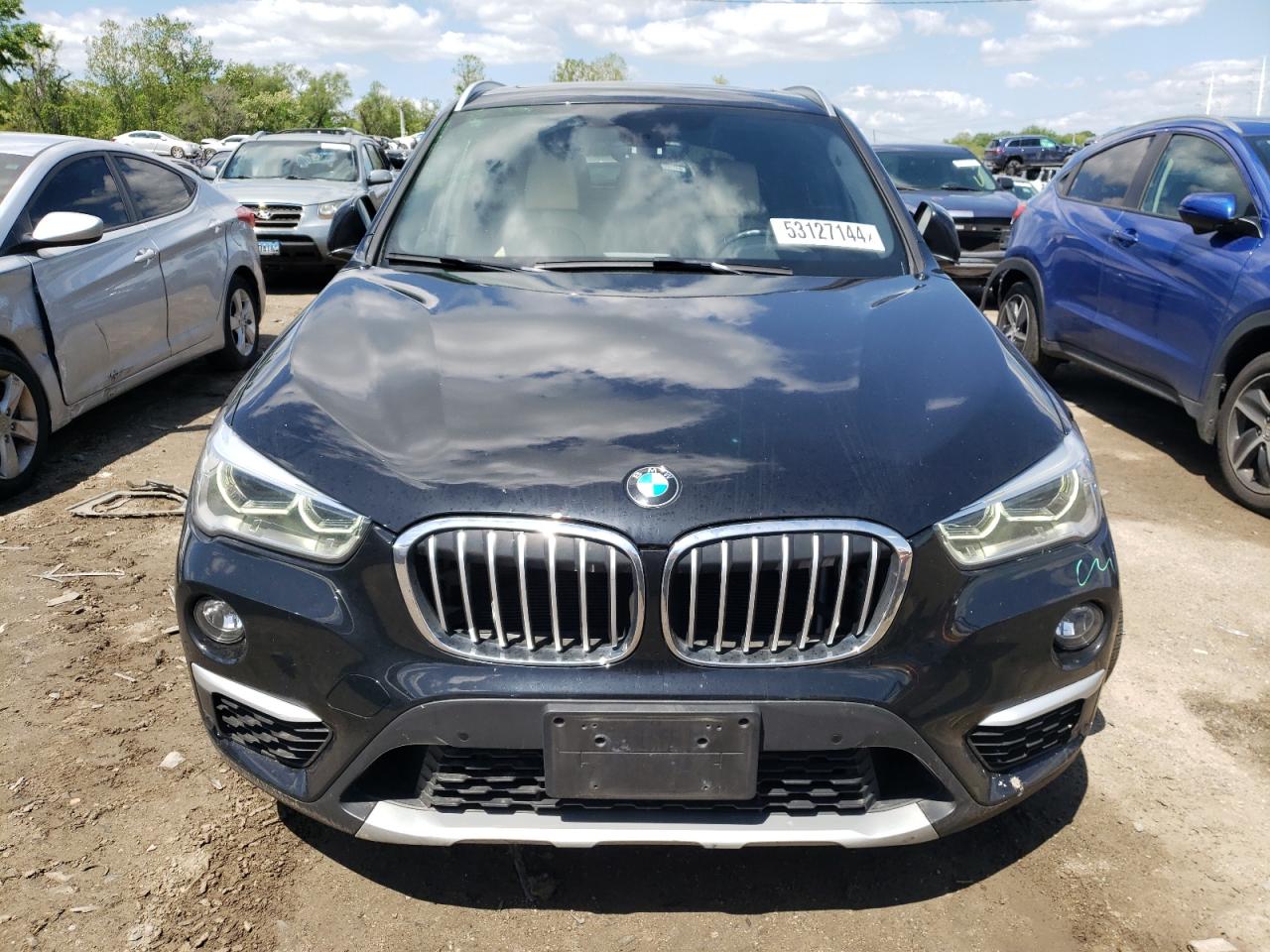 Photo 4 VIN: WBXHT3C3XH5F79682 - BMW X1 