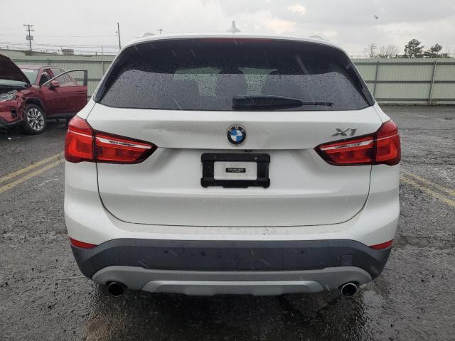 Photo 5 VIN: WBXHT3C3XH5F82033 - BMW X1 